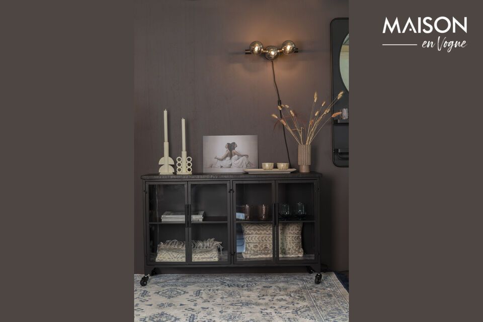 Contenitore e stile con la credenza nera su rotelle.